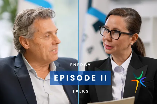 Two individuals in conversation, separated by a vertical line, with "Energy Episode II Talks" text overlay at the center.