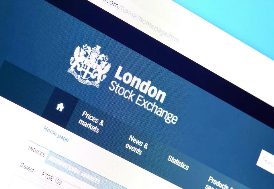 Close-up of a computer screen displaying the London Stock Exchange homepage, featuring navigation options like prices, markets, news, and statistics.